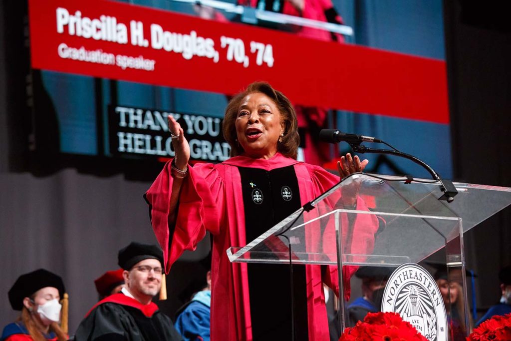 Priscilla H Douglas speaks at the podium at the 2022 CPS Bachelor's and Master's Graduation Ceremony. Photo by Heratch Ekmekijan