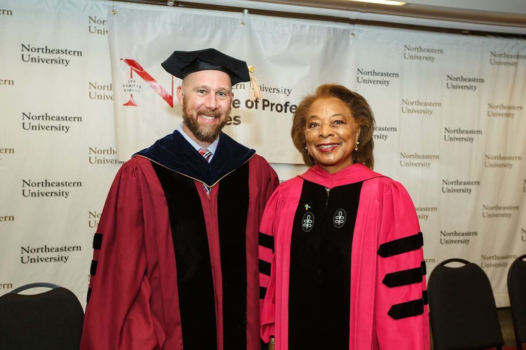 Interim Dean David Fields and Graduation Speaker Priscilla H Douglas pose for a photo at the 2022 CPS Bachelor's and Master's Graduation Ceremony on May 20, 2022. Photo by Heratch Ekmekijan