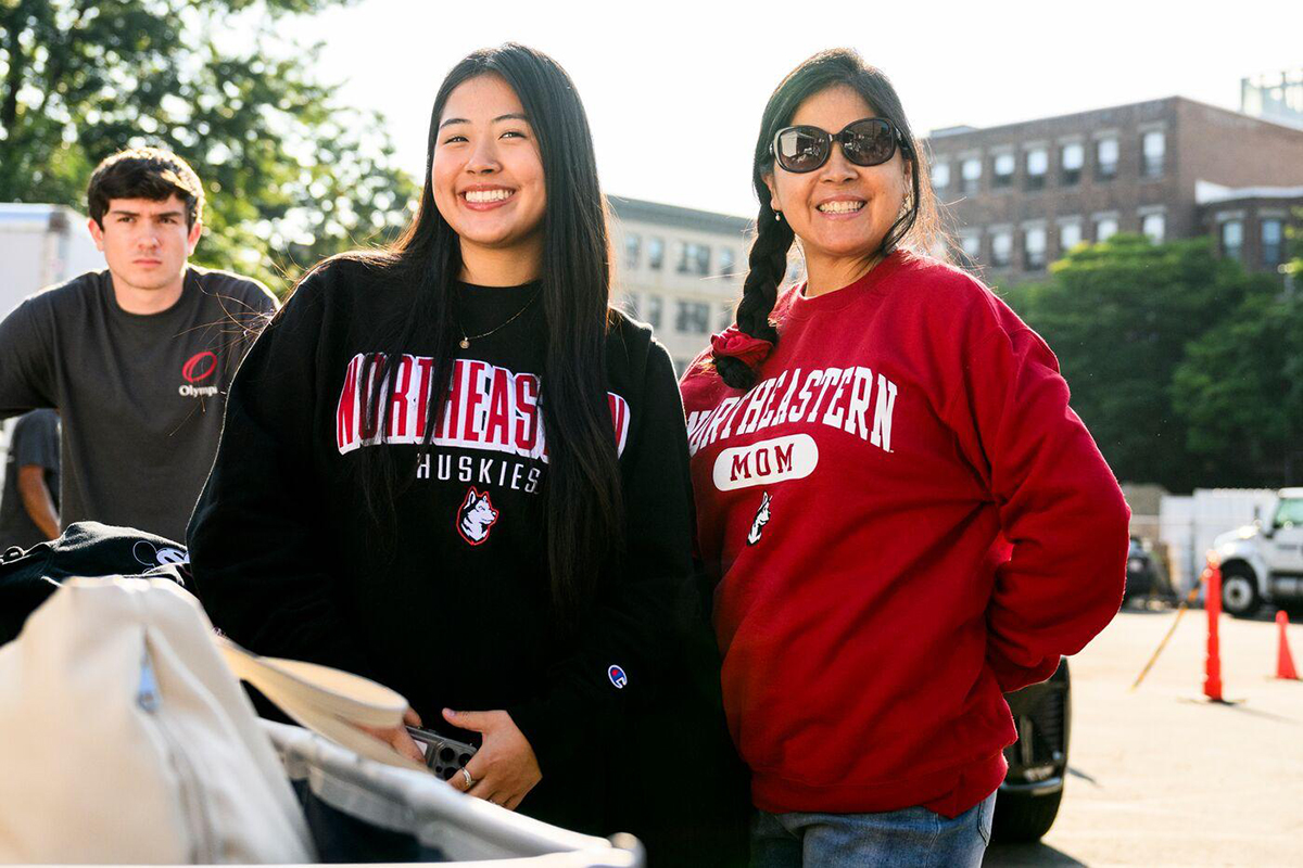 Northeastern students working together with digital tools